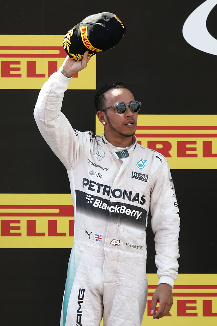 Formula One - F1 - Spanish Grand Prix 2015 - Circuit de Catalunya, Barcelona, Spain - 10/5/15 Mercedes' Lewis Hamilton celebrates his second place Reuters / Gustau Nacarino