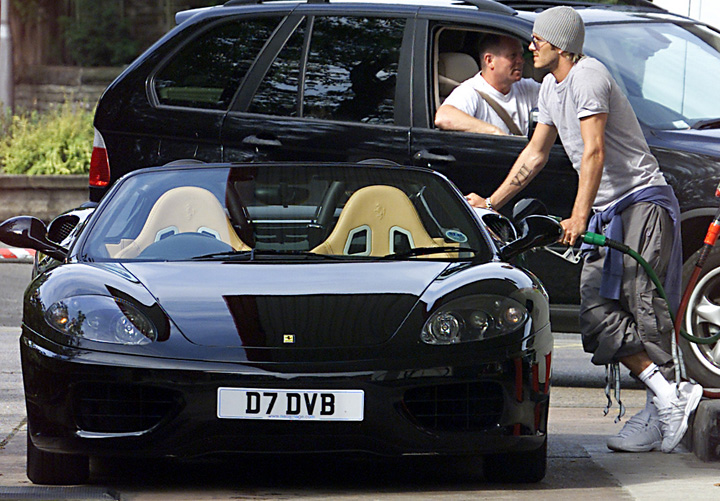 David Beckham spotted filling his Ferrari with petrol in Wilmslow, Cheshire.