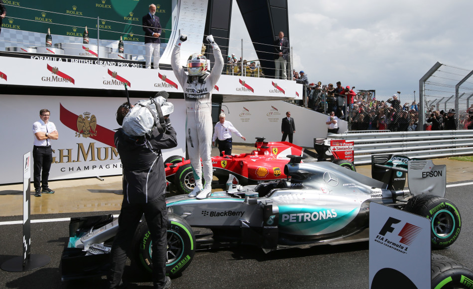 Formula One - F1 - British Grand Prix 2015 - Silverstone, England - 5/7/15 Mercedes' Lewis Hamilton celebrates his win Reuters / Paul Childs